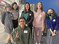  Students pose with project at Environmental Summit